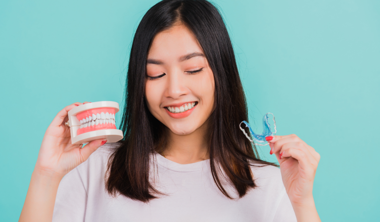 Orthodontics technology comparison showing traditional braces and clear aligners at Dentistry on Lawrence